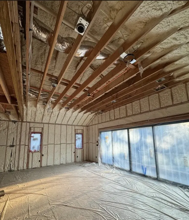 Interior walls and ceiling insulated with spray foam during new construction in Hammond